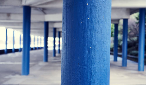 Close-up of blue metal railing