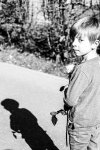 Boy standing outdoors