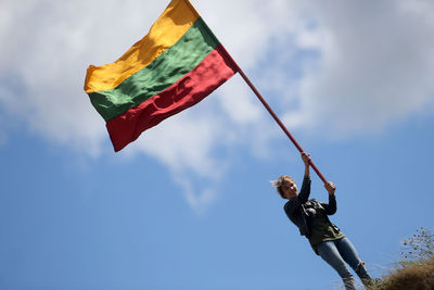 Low angle view of flag against sky