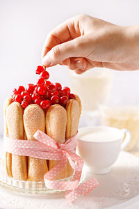 Close-up of hand holding ice cream