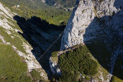 High angle view of people rock climbing