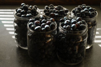 High angle view of fruits in jar on table