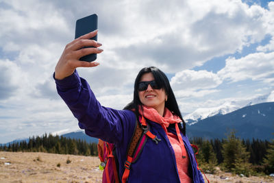 Young woman using mobile phone