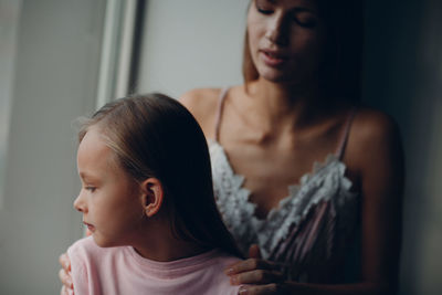 Portrait of mother and daughter