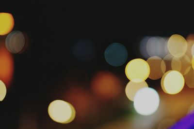 Defocused image of illuminated lights at night