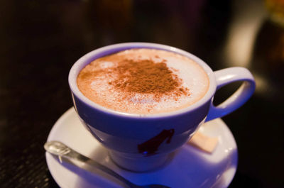 Close-up of cappuccino on table