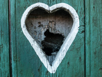 Close-up of heart shape on door