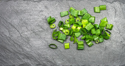 Directly above shot of green leaves on white background