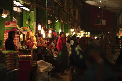 Crowd in market at night