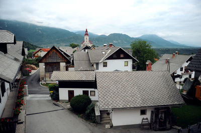 Town against cloudy sky