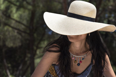 Portrait of woman wearing hat