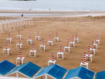 High angle view of people walking on beach