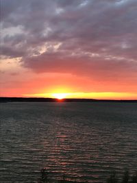 Scenic view of sea against romantic sky