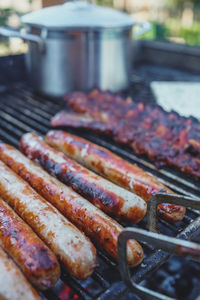 Close-up of meat on barbecue grill