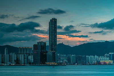 Modern buildings in city against sky