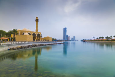 View of buildings against sky in city