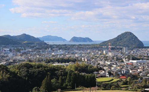 Panoramic view of town and seascape with islands