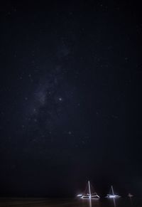 Low angle view of stars against sky at night