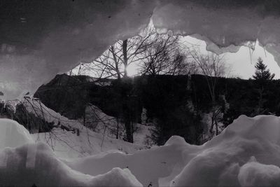 Scenic view of snow covered mountains