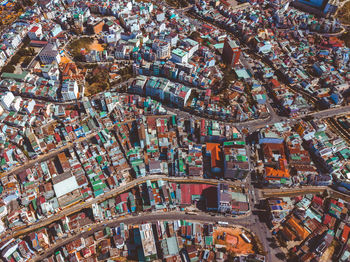 Aerial view of modern buildings in city against sky