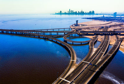 Scenic view of bridge over sea against sky