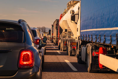 View of vehicles on road against the sky