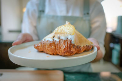 Close-up of hand holding food