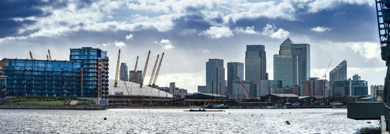 Panoramic view of greenwich dome and canary wharf against sky