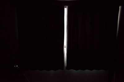 View of illuminated dark room