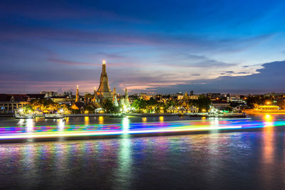 Illuminated buildings in city at night