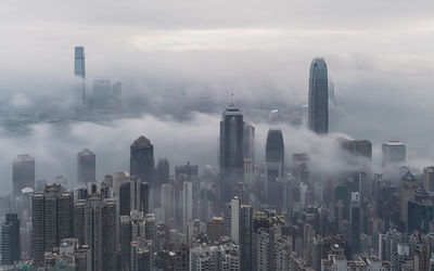 Morning aerial view of sea of clouds cityscape, hong kong