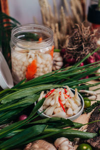 Close-up of fruits in jar on table