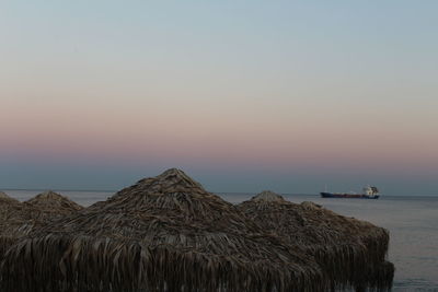 Panoramic view of sea against clear sky