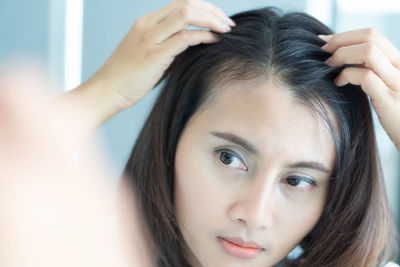 Close-up portrait of young woman