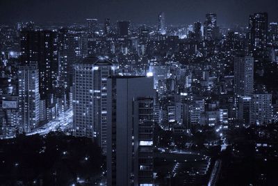 Illuminated cityscape at night