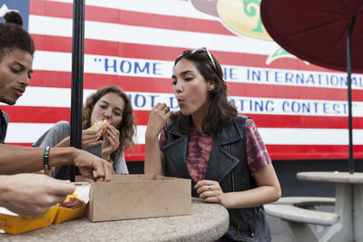 Friends enjoying fast food