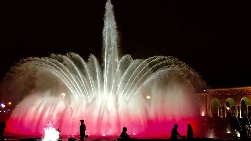 Firework display at night