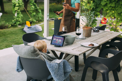 Father and son in garden