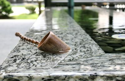 Close-up of rusty metal on table