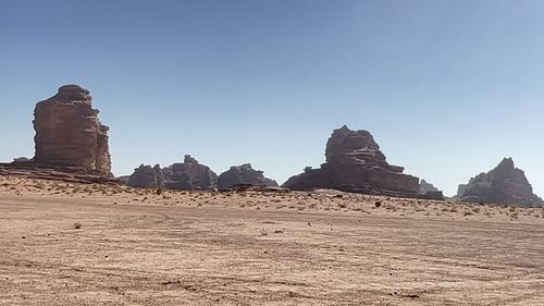 View of rock formations against clear sky