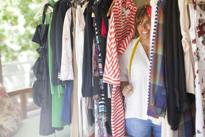 Clothes hanging in store for sale at market