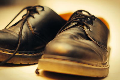 Close-up of black leather shoes.