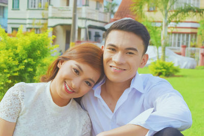 Portrait of smiling young couple