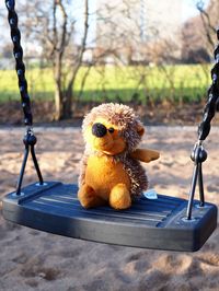 Close-up of swing in playground