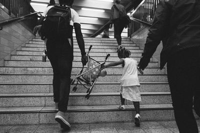 People standing on staircase