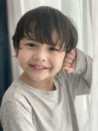 Portrait of cute boy smiling