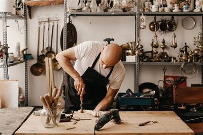 Man working on table