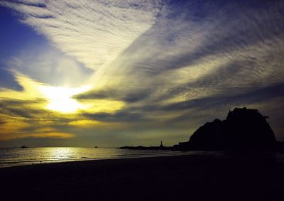 Scenic view of sea against dramatic sky