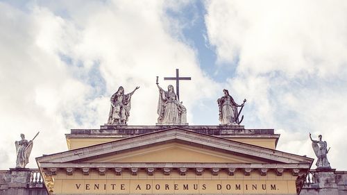 Low angle view of statue against sky