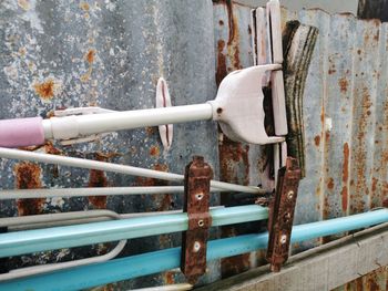 Close-up of rusty pipe in city